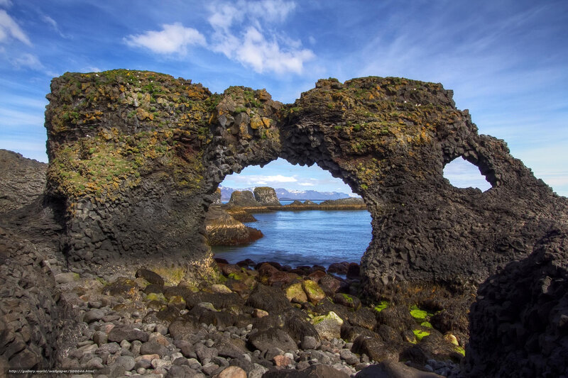 Natural rock arch by the sea