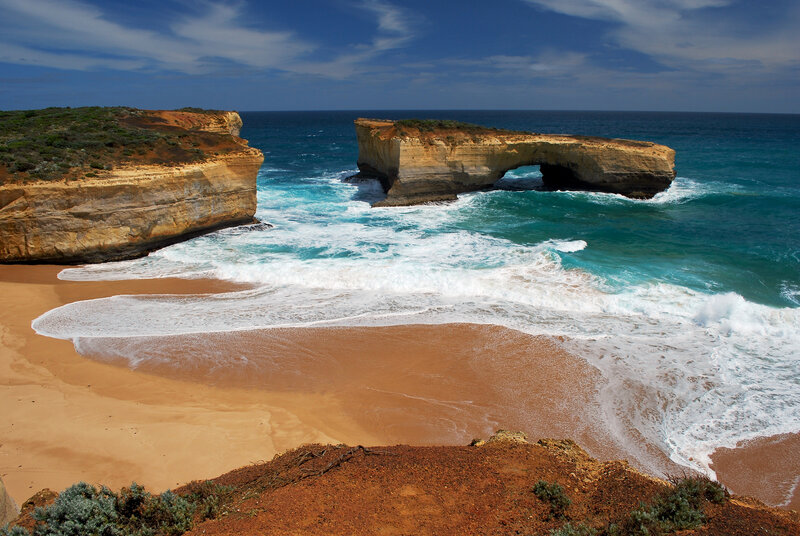 Natural Rock Arch Formation — Blue, Dramatic, Afternoon, Photograph, Cliffs