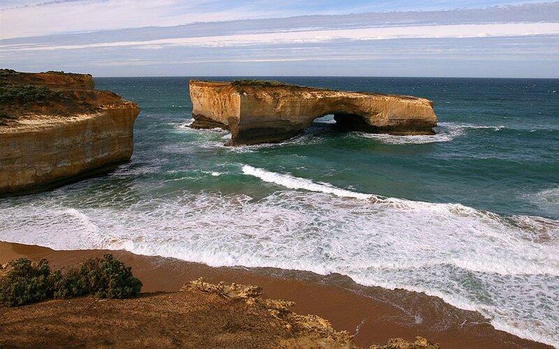 Natural Rock Arch Formation — Blue, Dramatic, Afternoon, Photograph, Ocean