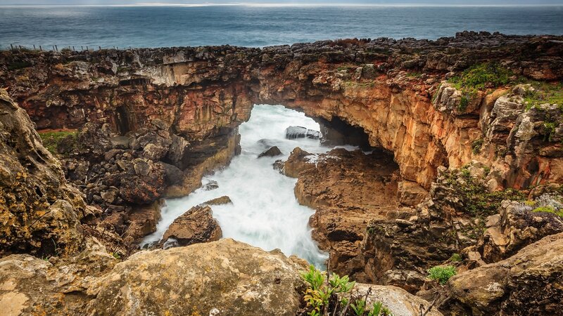 Natural Rock Arch Formation — Blue, Dramatic, Afternoon, Photograph