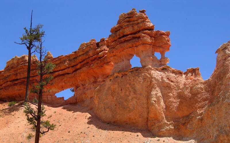 Natural Rock Arch Formation — Orange, Dramatic