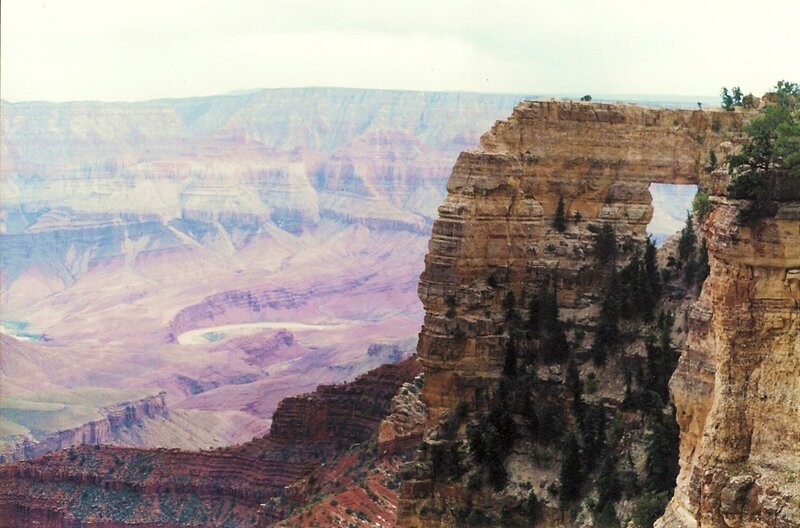 Natural Rock Arch in Canyon — Brown