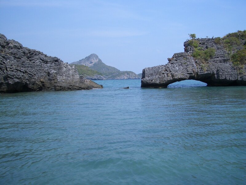 Natural rock arch in coastal waters