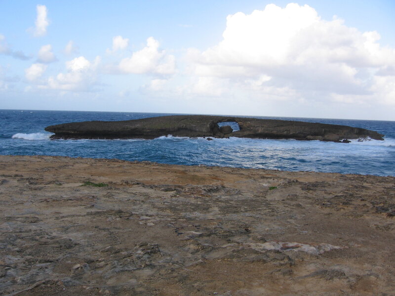 Natural rock arch in the ocean