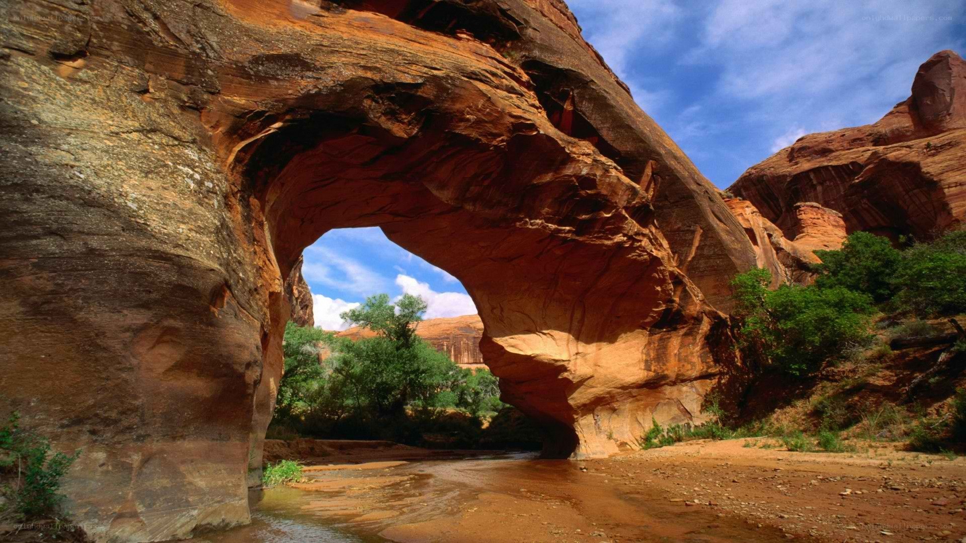Natural rock arch over river