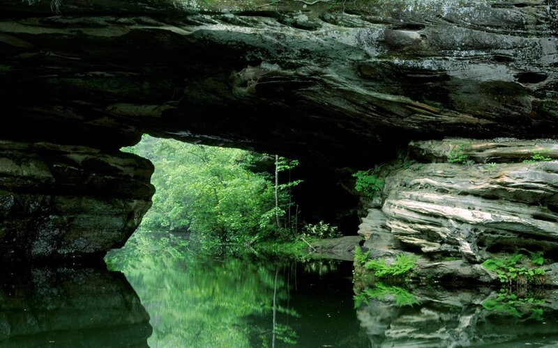 Natural Rock Arch over River — Green, Serene, Afternoon, Photograph
