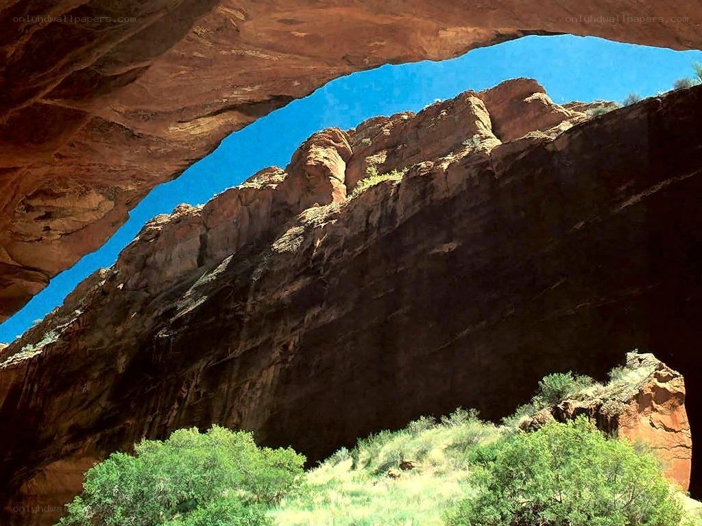 Natural rock arch with blue sky