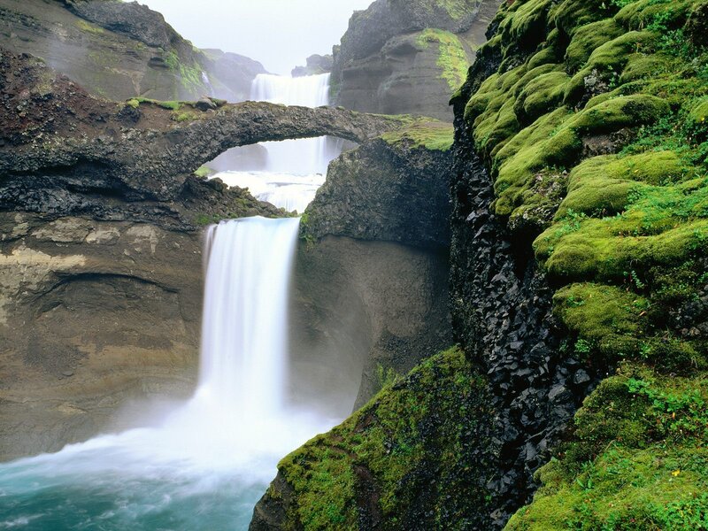 Natural rock bridge waterfall