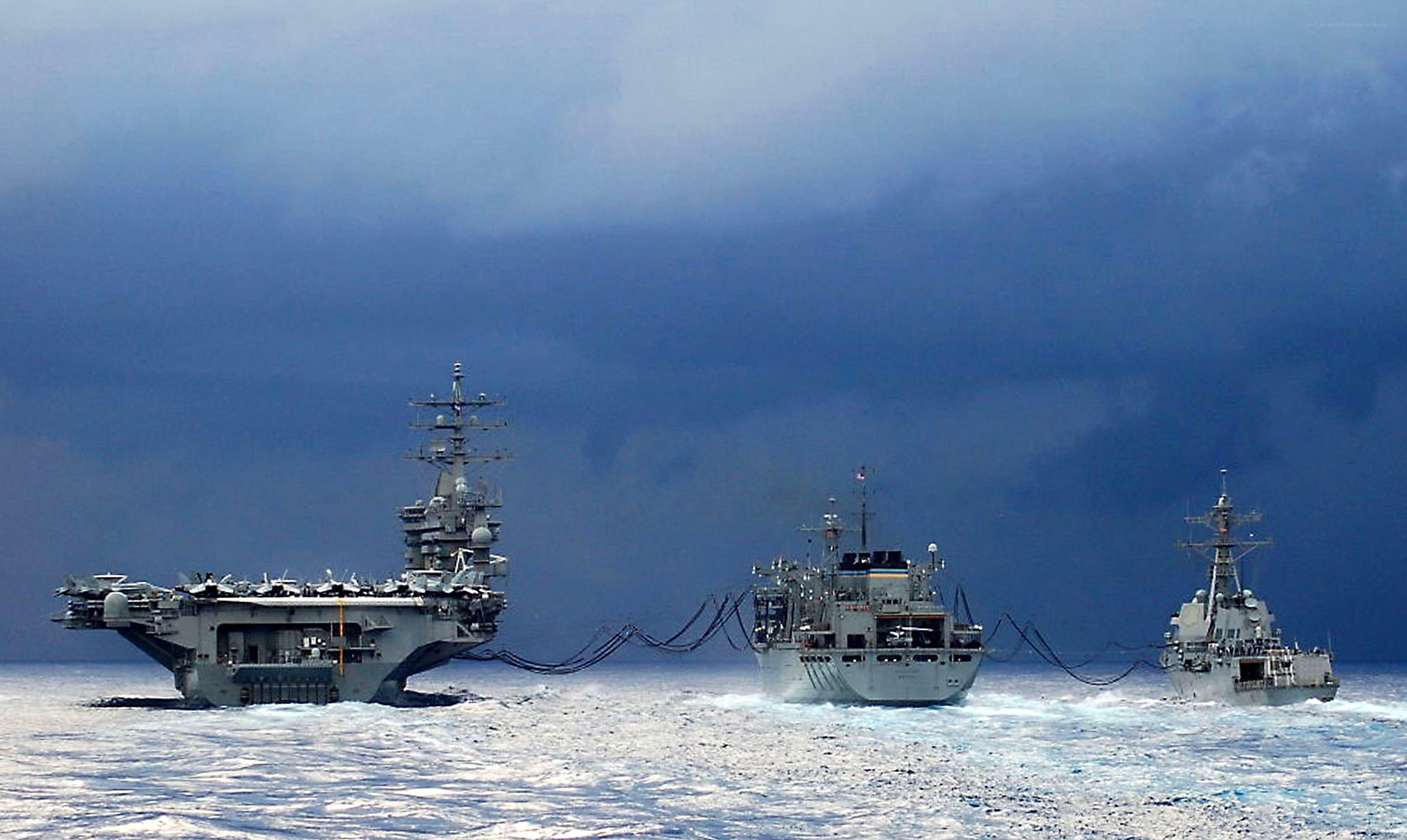 Naval fleet refueling at sea