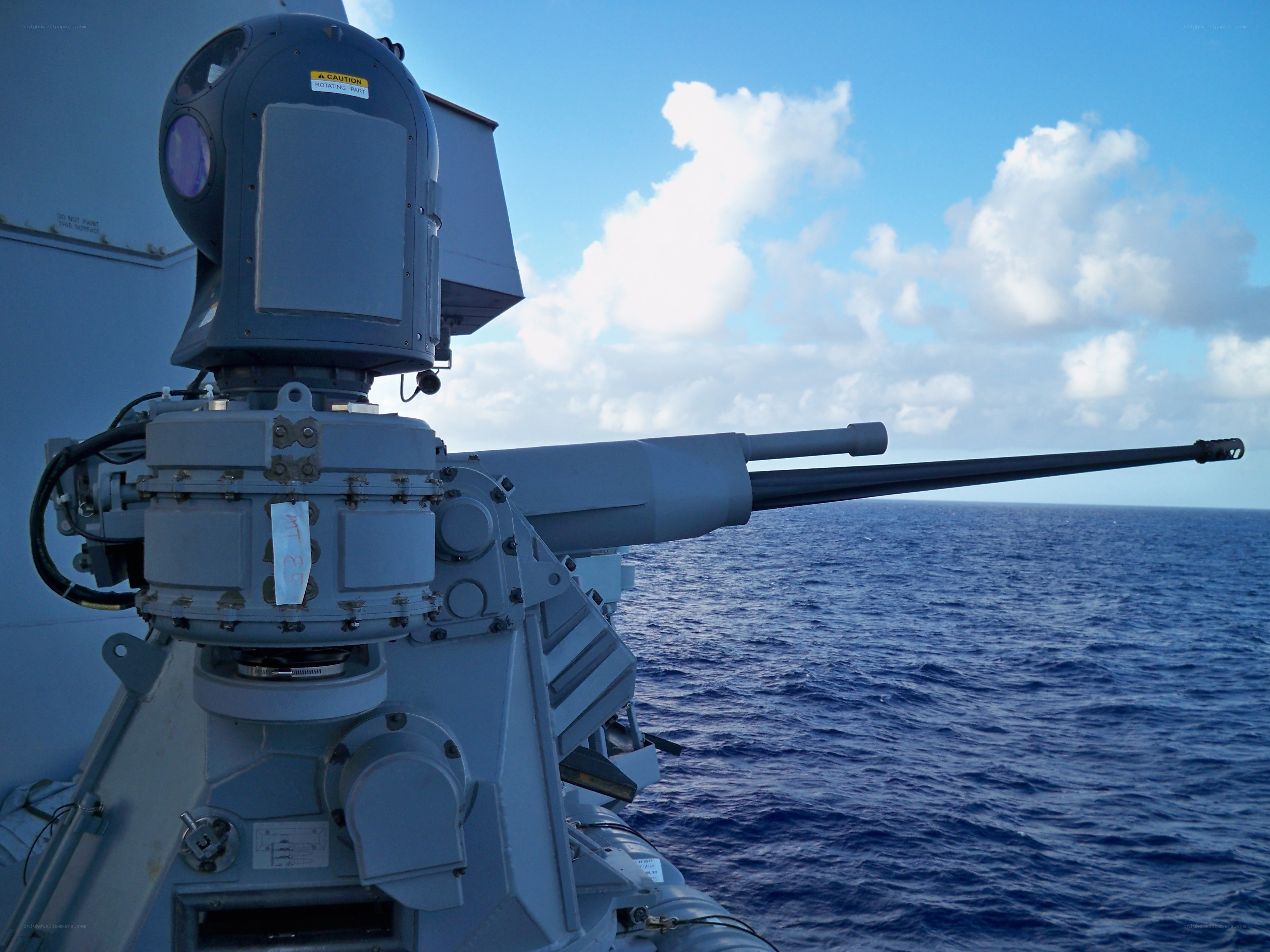 Naval gun on ship deck