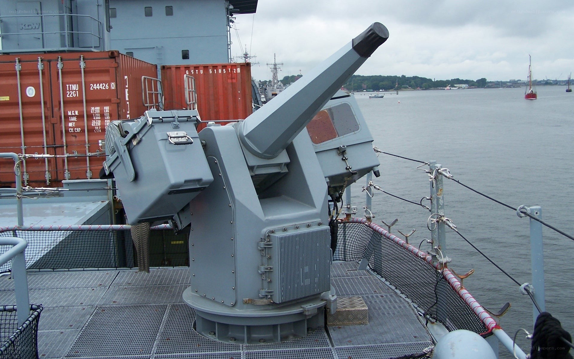 Naval gun on ship deck
