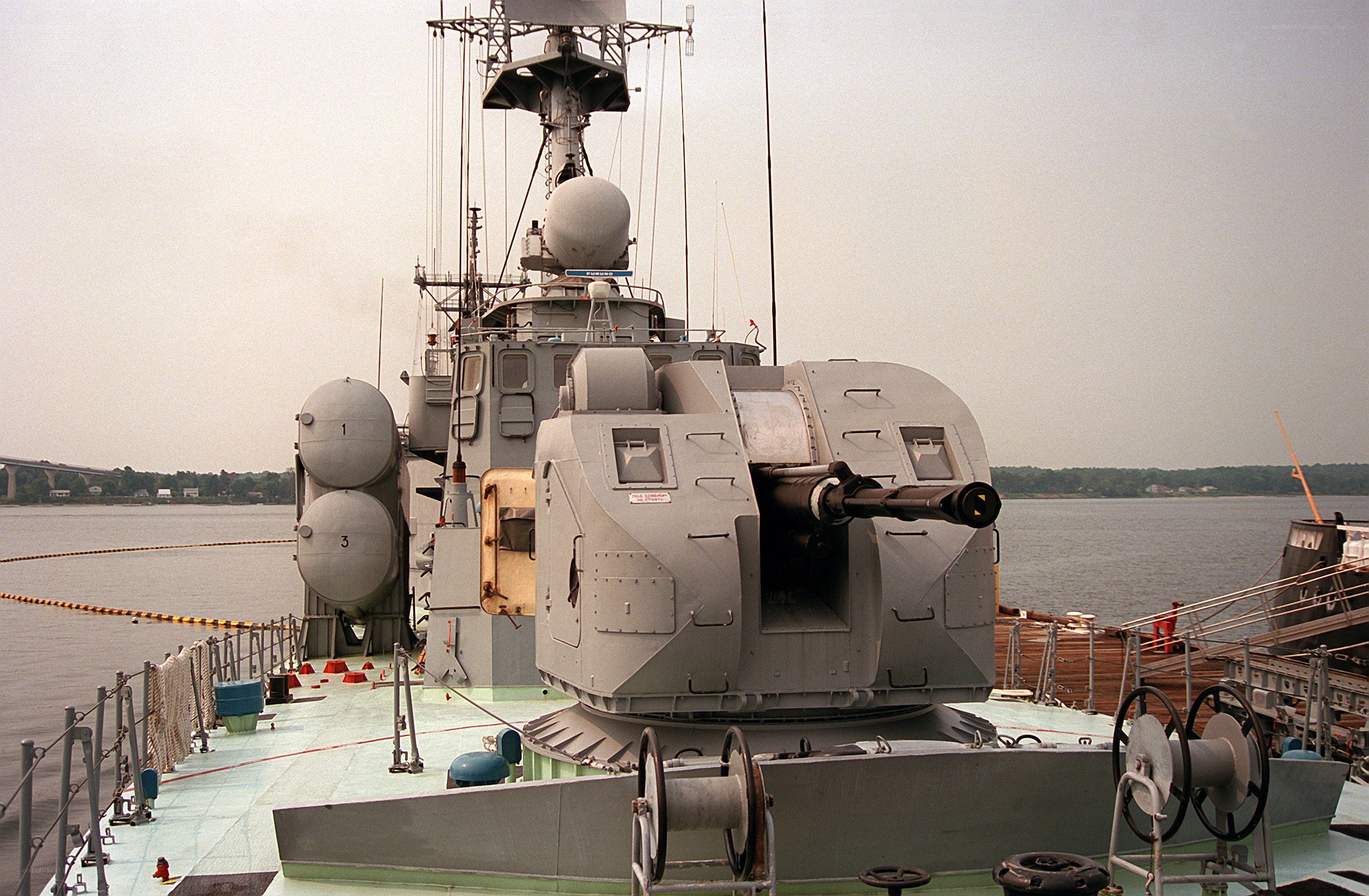 Naval gun on ship deck