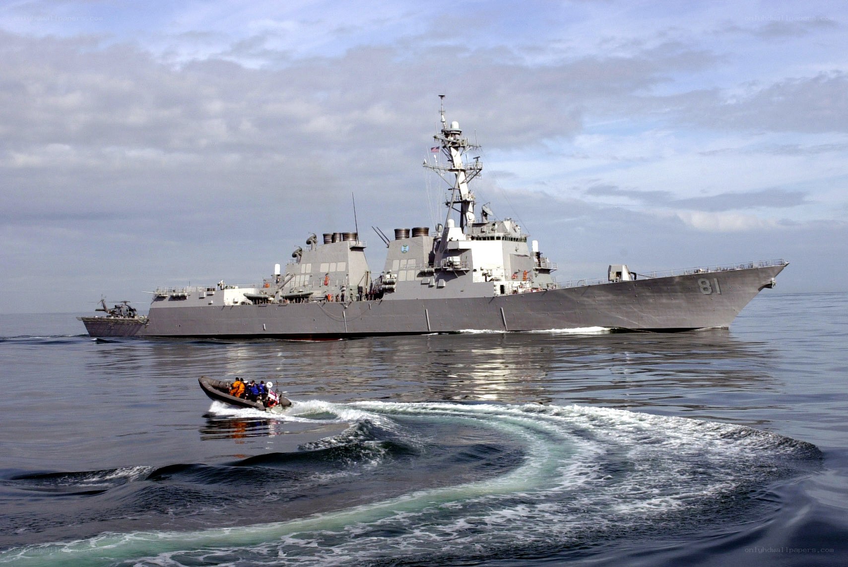 Naval ship and inflatable boat