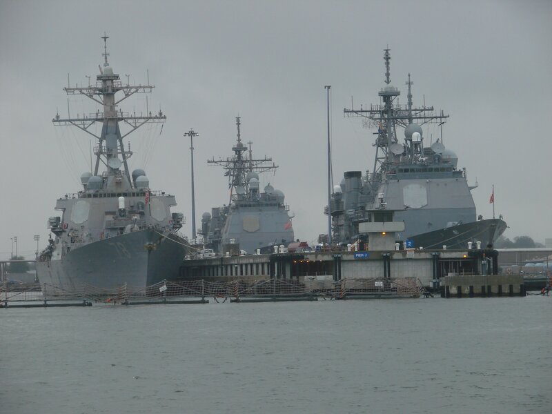 Naval ships at a dock