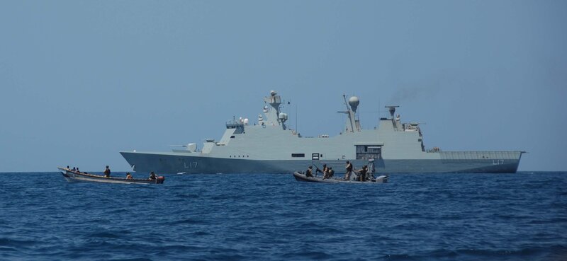 Naval vessel with small boats