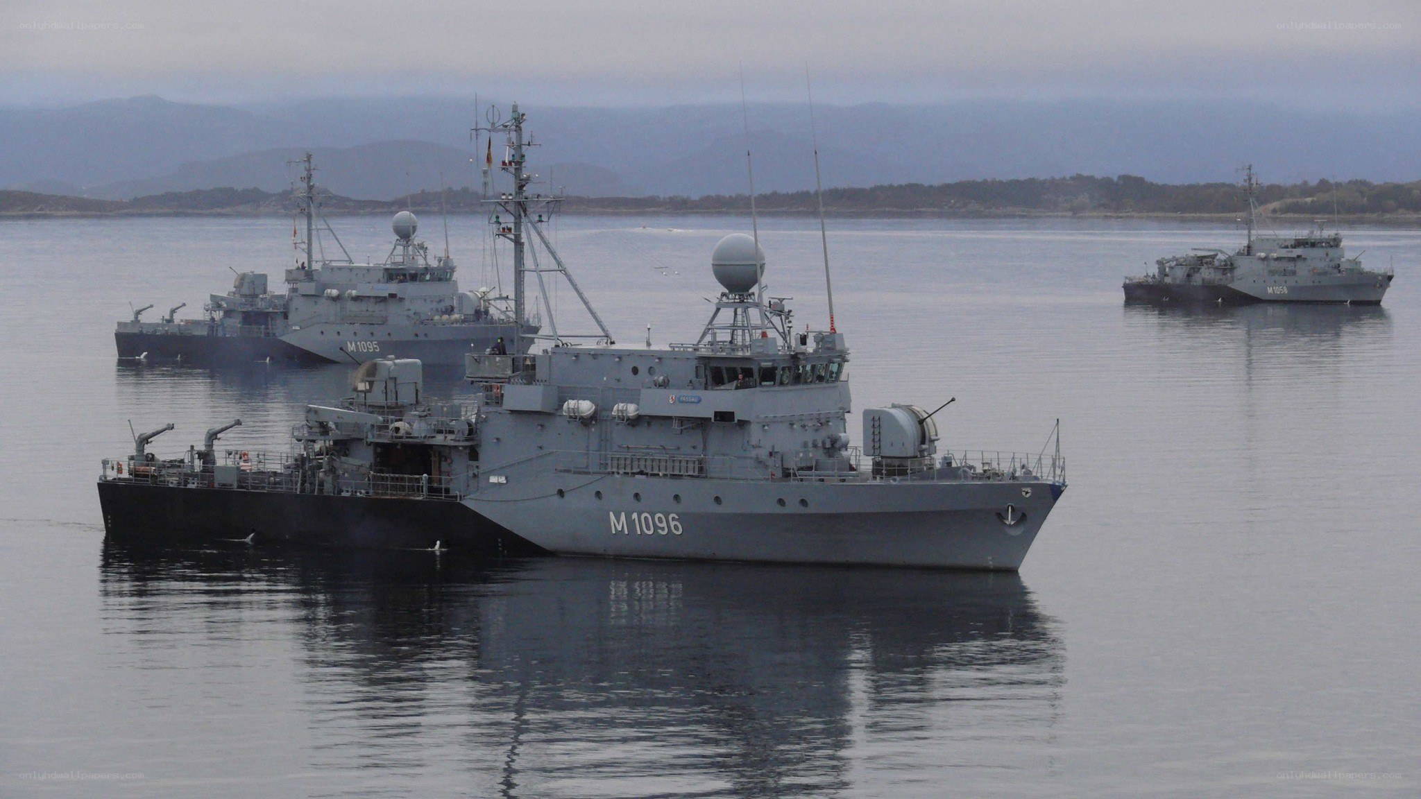 Naval vessels in a harbor