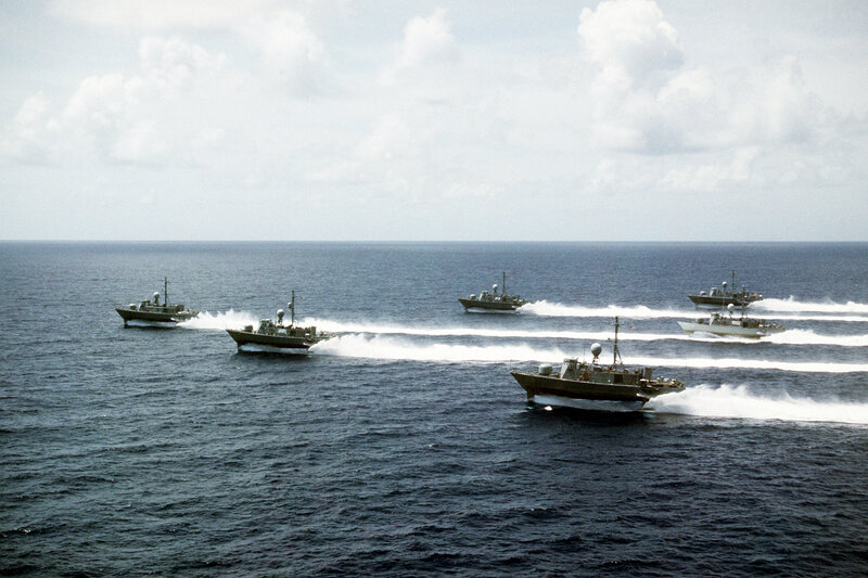 Naval vessels in formation at sea