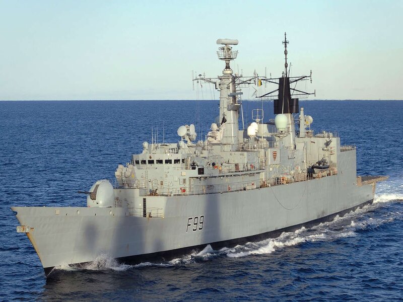 Naval Warship at Sea — Gray, Calm, Afternoon, Photograph
