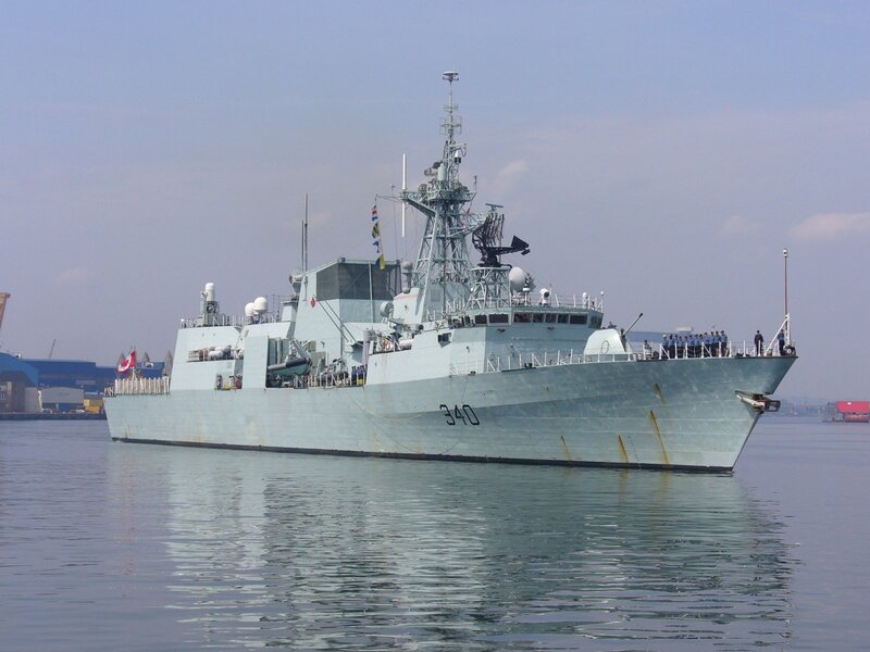 Naval Warship in Harbor — Gray, Calm, Afternoon