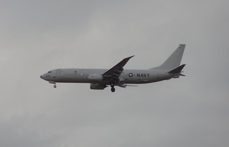 Navy Aircraft in Flight — Gray, Overcast, Photograph