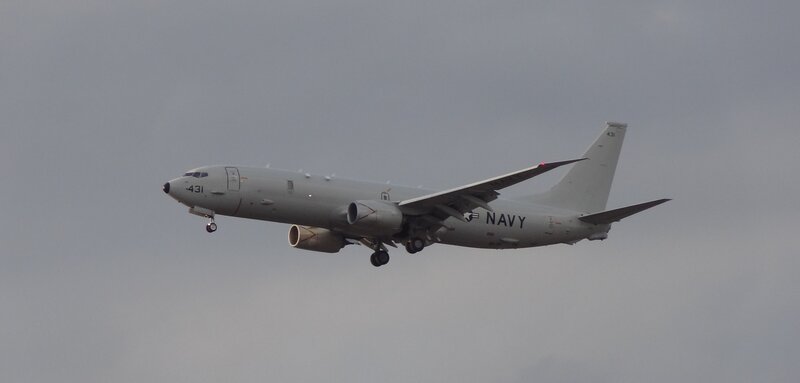 Navy Aircraft in Flight — Gray, Overcast