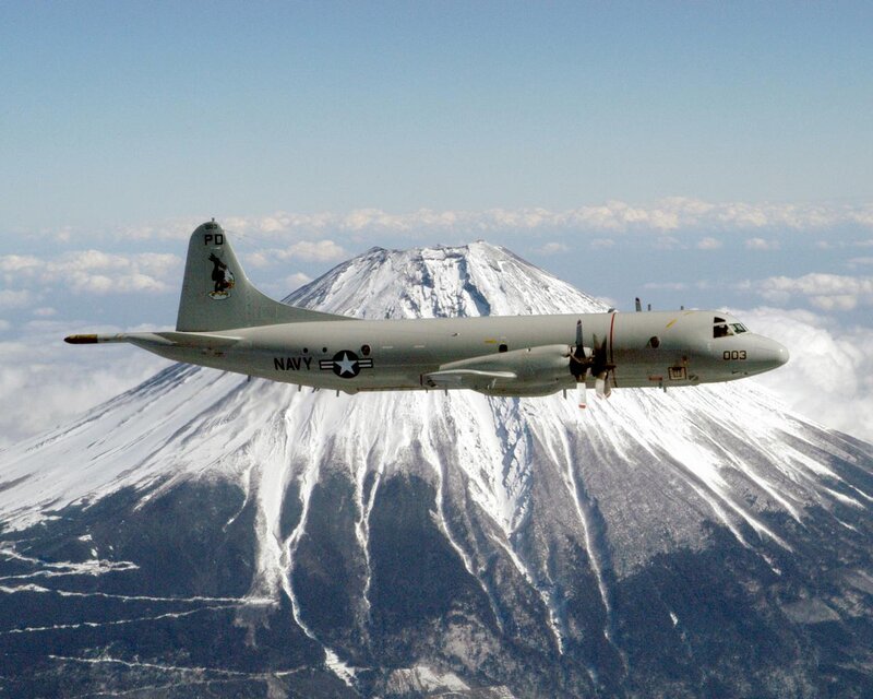 Navy Aircraft over Mountain