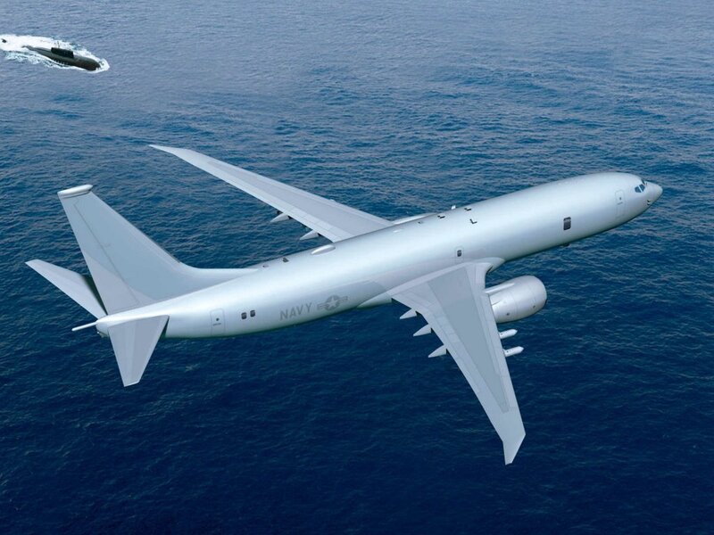 Navy aircraft over ocean