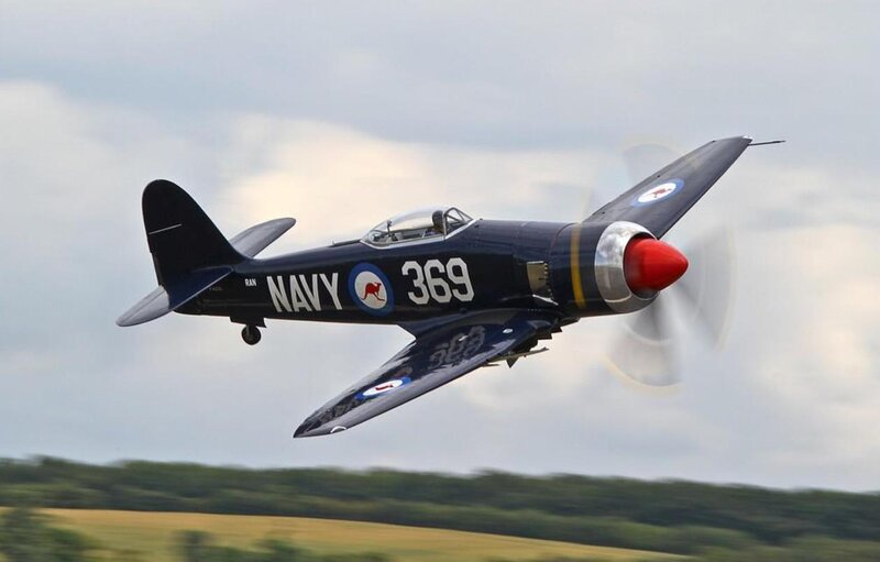 Navy Fighter Plane — Blue, Dynamic, Afternoon, Photograph, Propeller