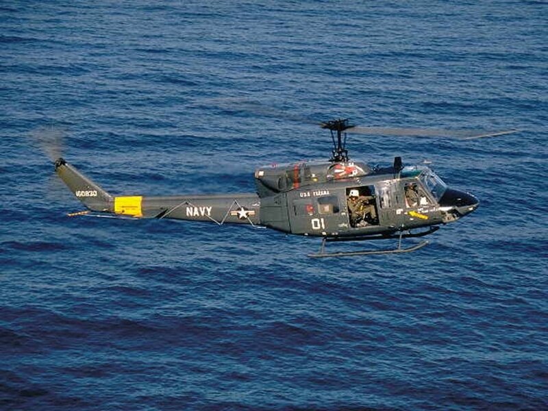 Navy Helicopter over Ocean — Blue, Calm