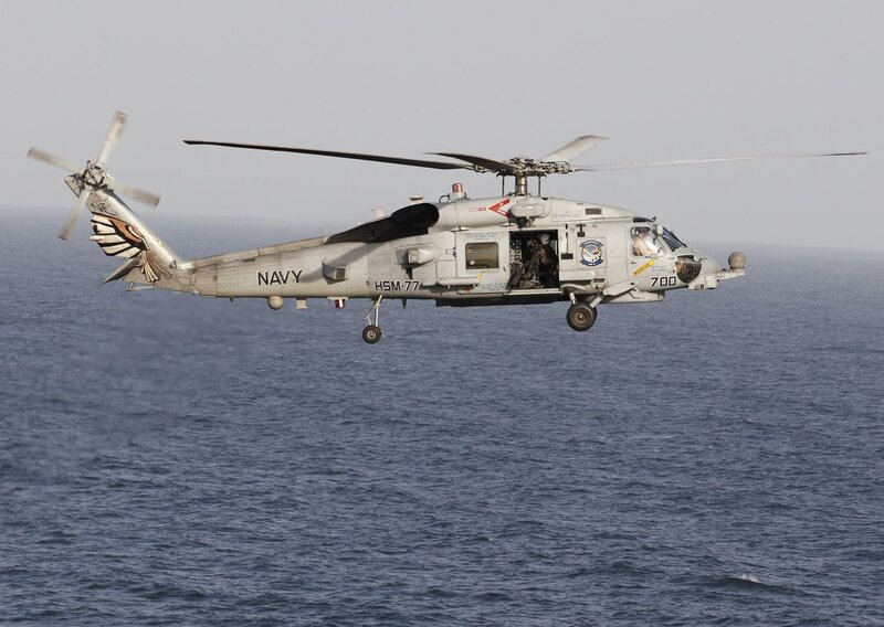 Navy Helicopter over Ocean — Gray