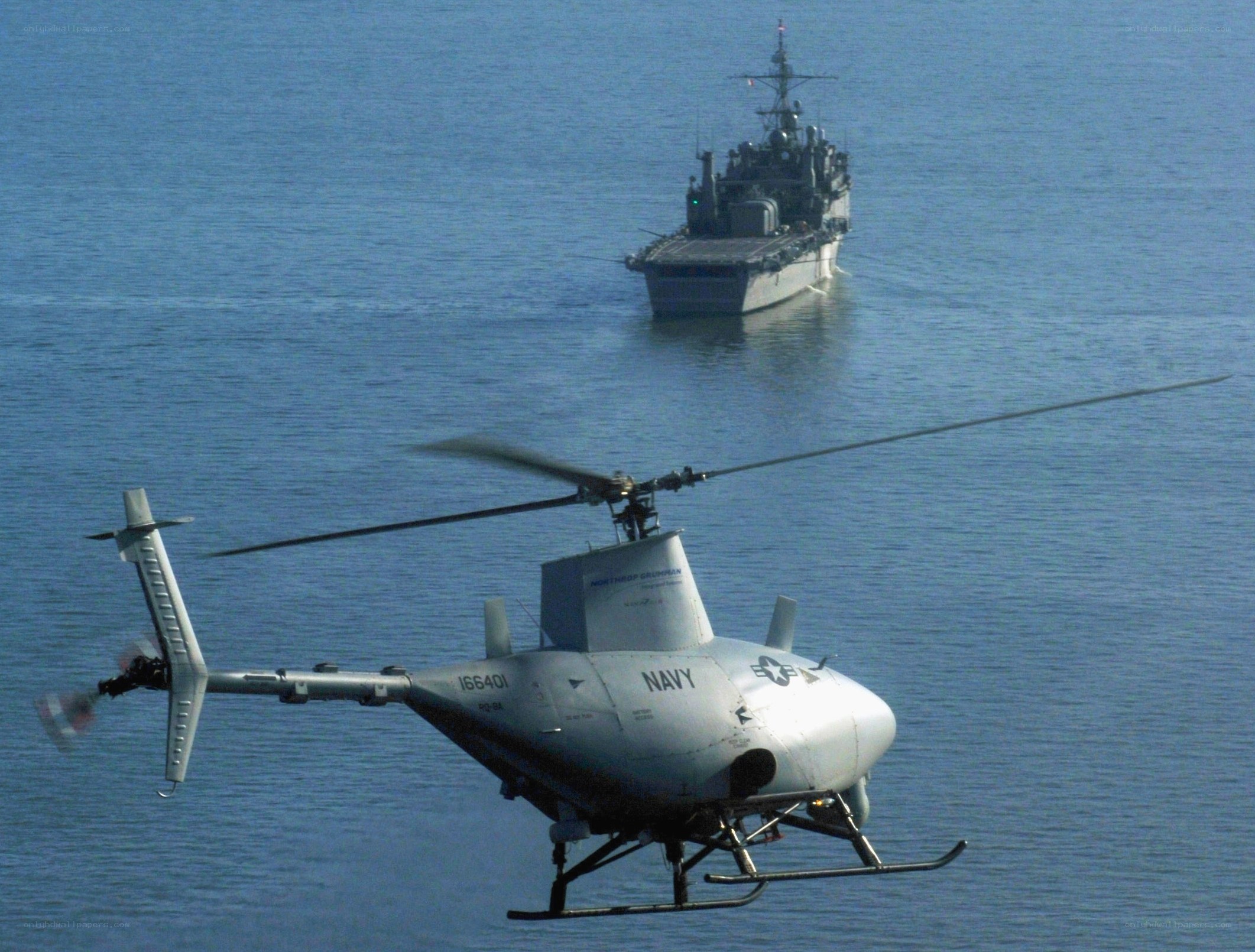 Navy helicopter over water