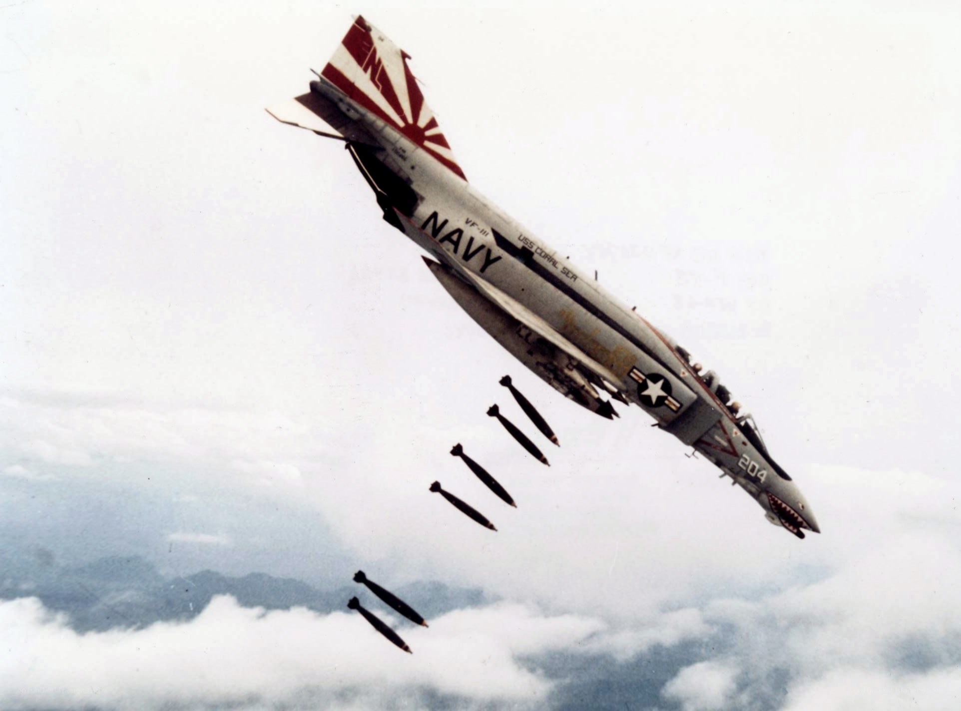 Navy jet dropping bombs