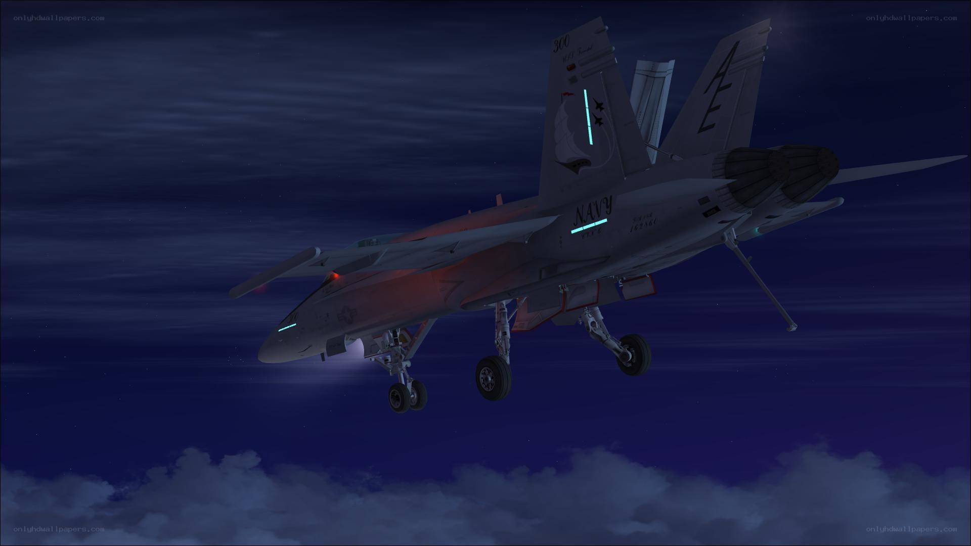 Navy jet in flight at night