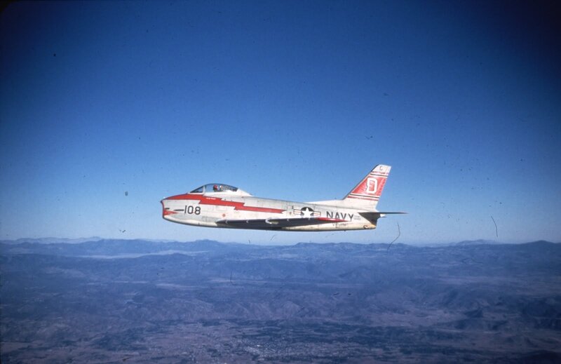 Navy Jet in Flight — Blue