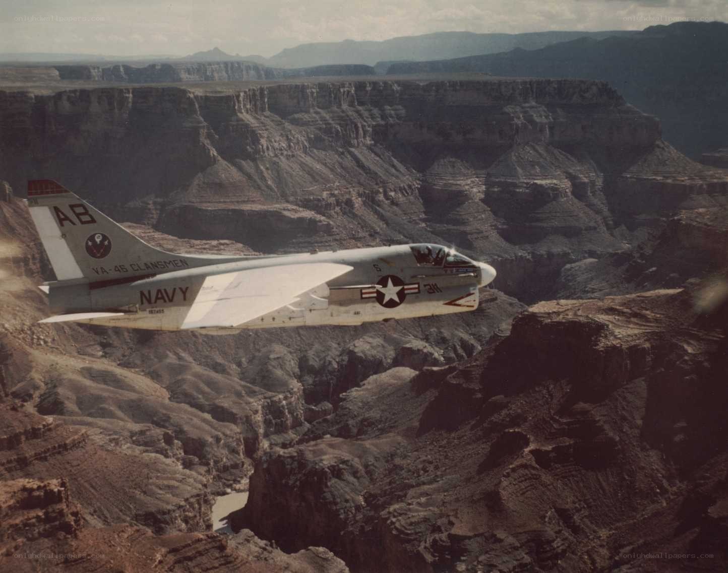Navy jet over canyon