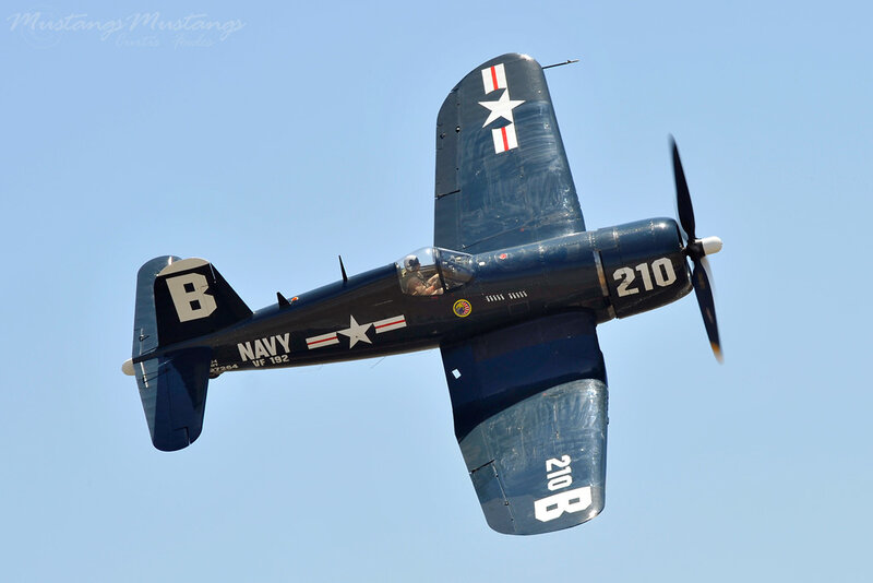 Navy Propeller Plane — Blue, Clear, Afternoon, Photograph