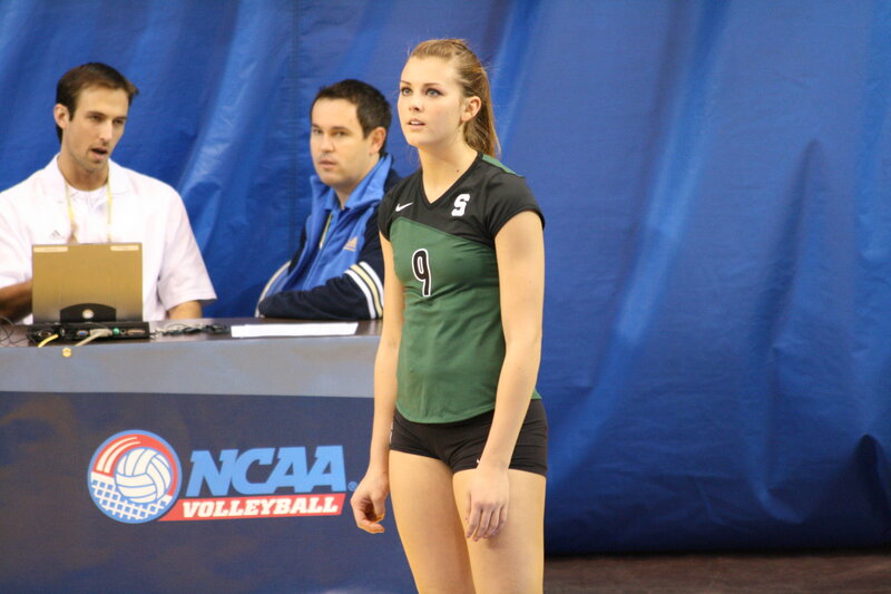 NCAA volleyball player on court