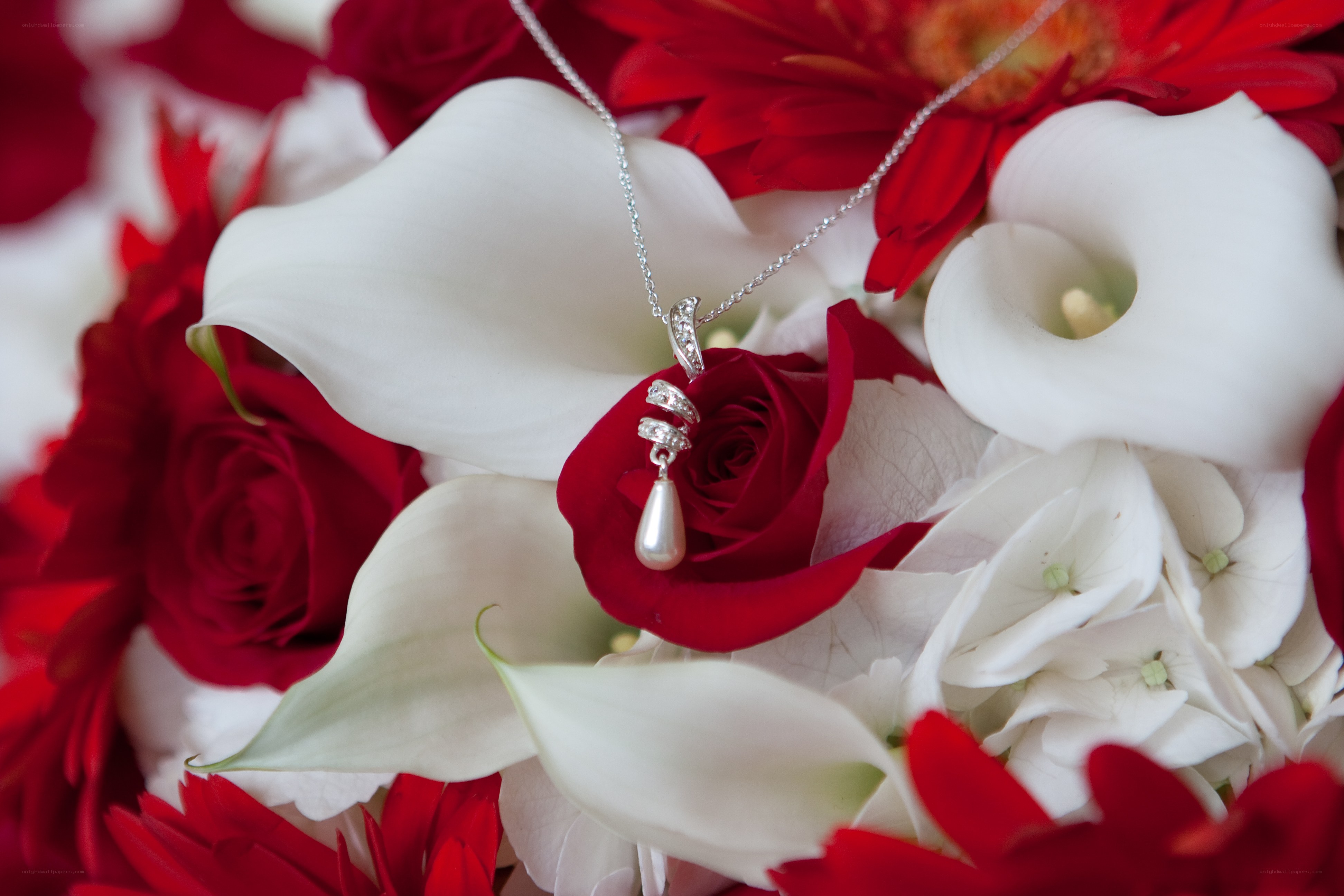 necklace on floral arrangement