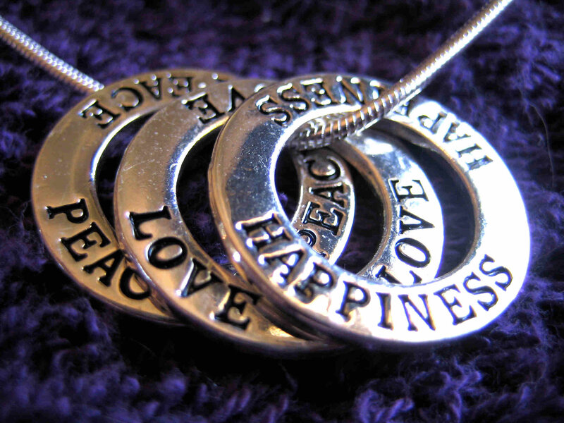 necklace with peace love happiness rings