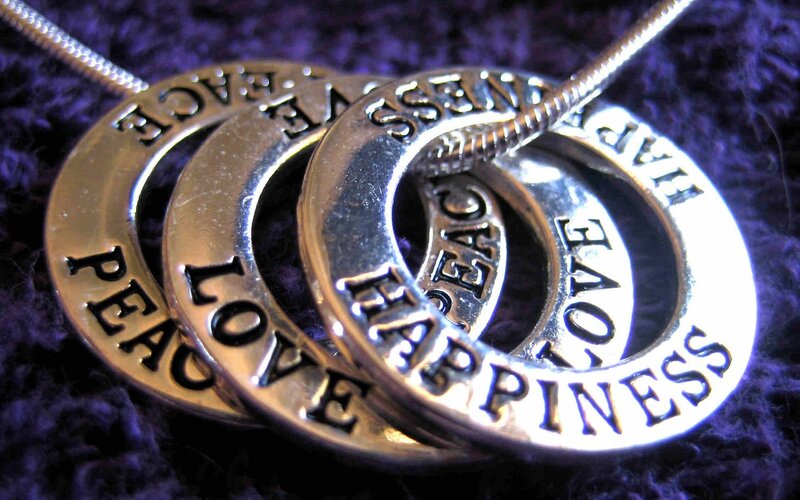 necklace with peace love happiness rings