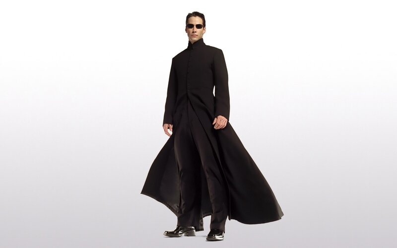 Neo in a black coat