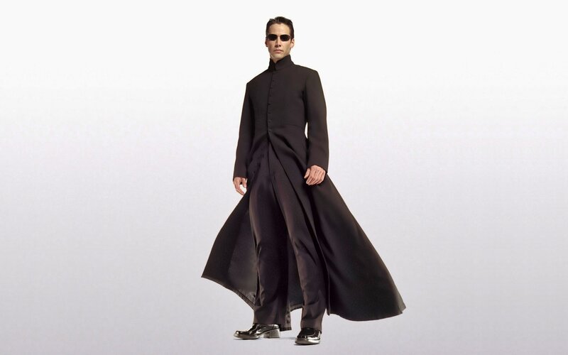 Neo in black coat