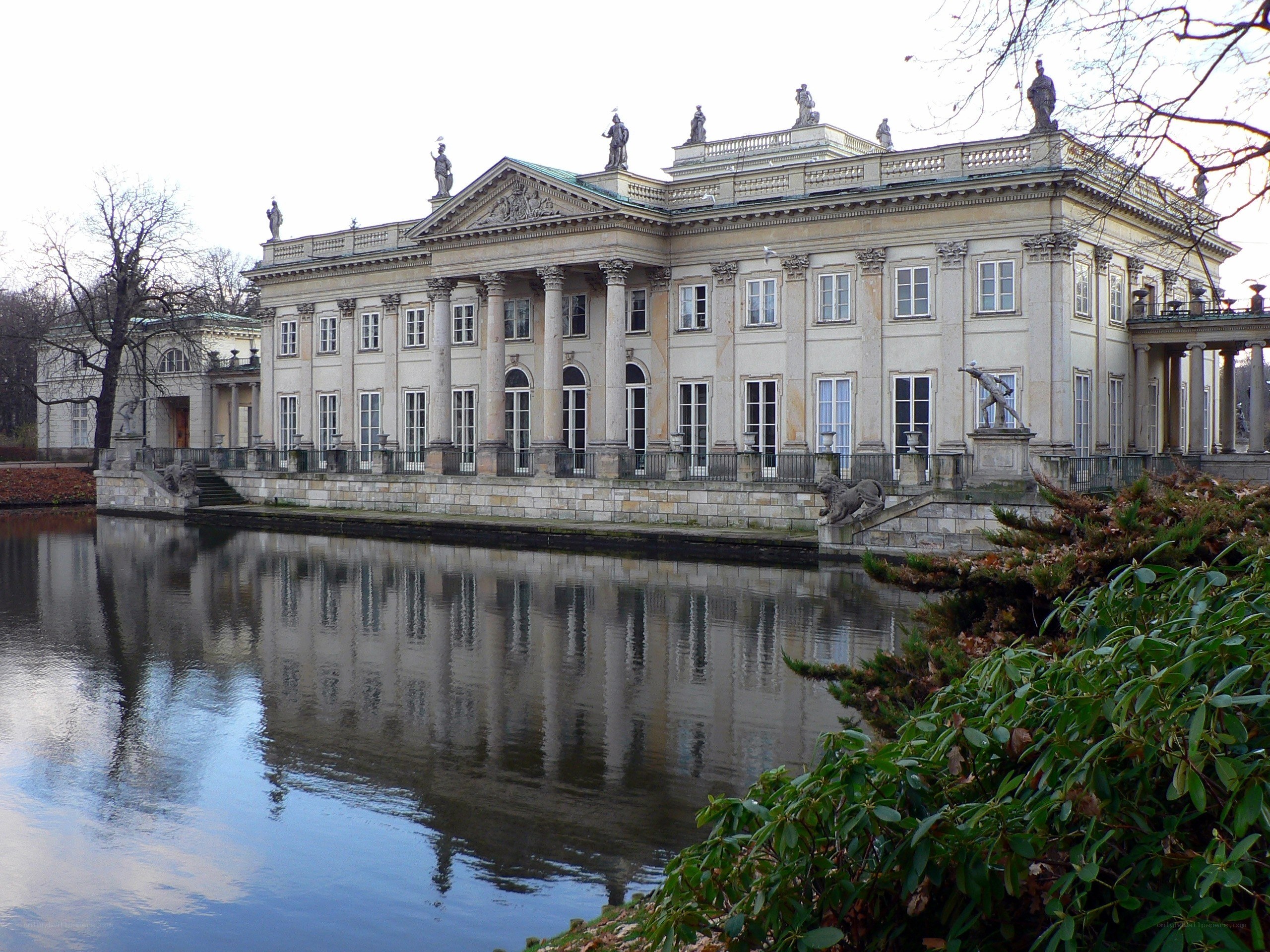 neoclassical palace by a pond