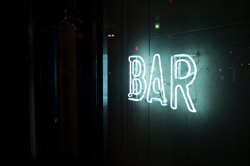 Neon bar sign at night