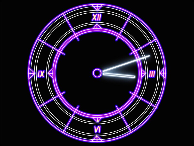 neon clock with roman numerals