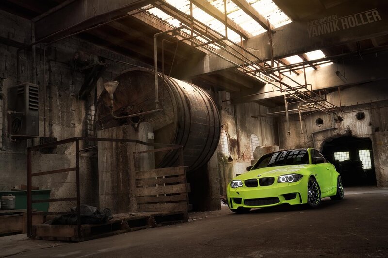 Neon green car in old factory