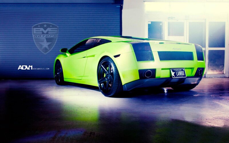 neon green lamborghini in garage