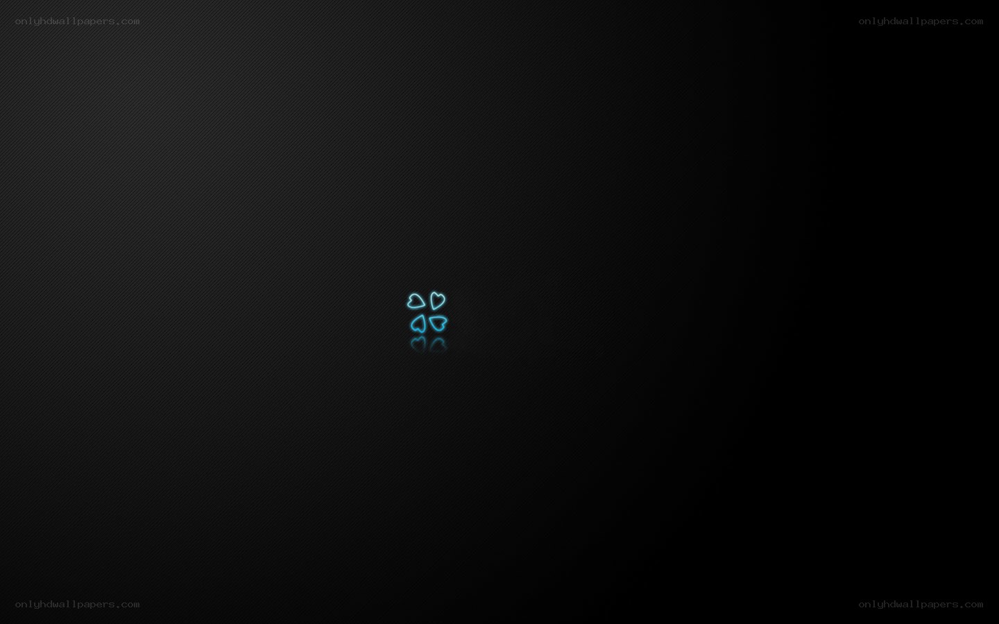 neon hearts on dark background
