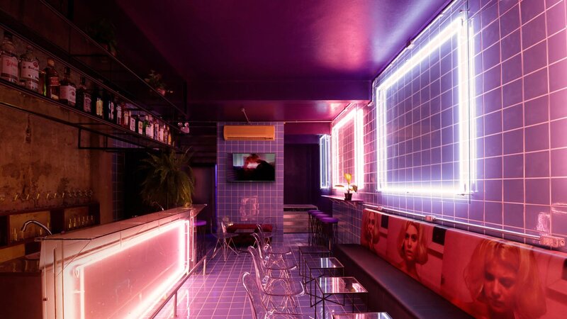Neon-lit Bar Interior — Purple