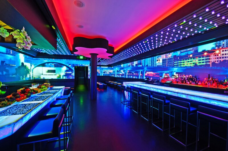neon-lit bar interior